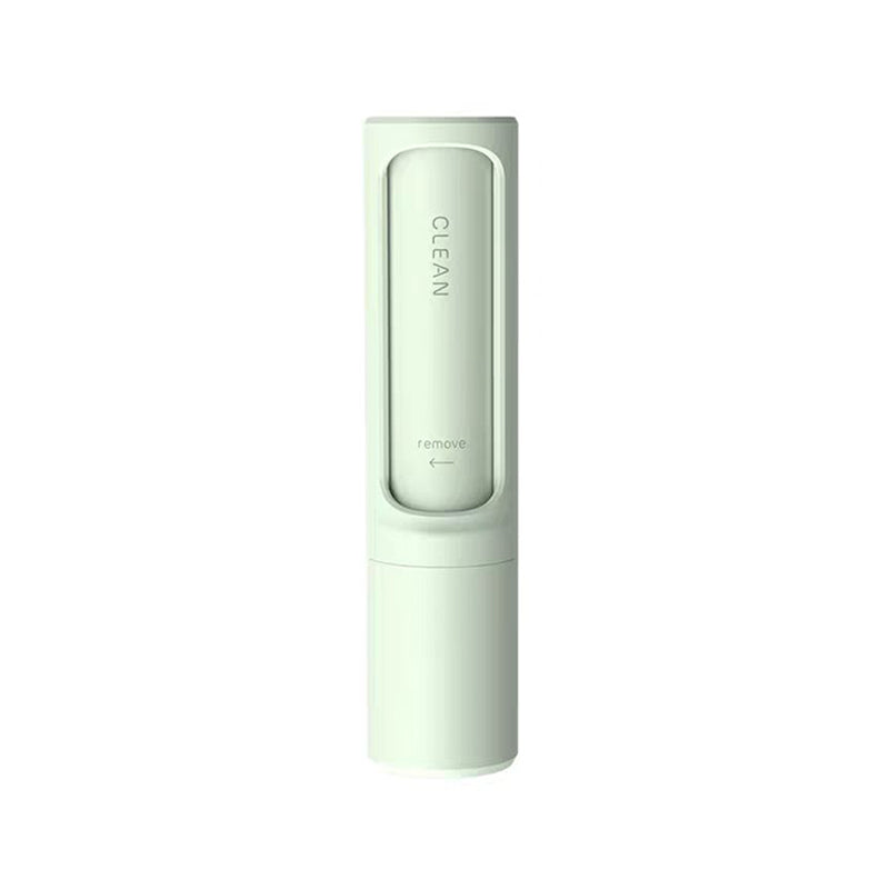 Green reusable pet-hair remover with storage base