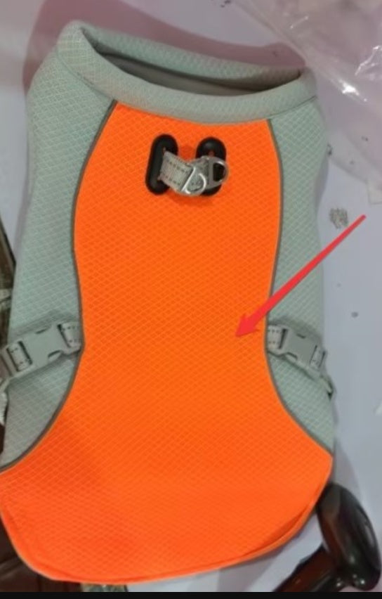 Orange and gray breathable dog cooling vest with adjustable buckles and leash attachment